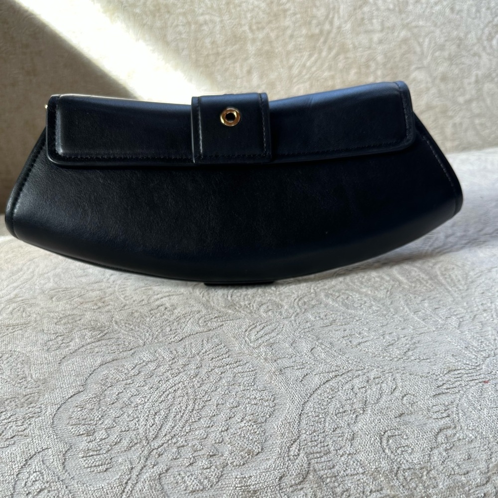 Michael Kors Black Curved Clutch with Gold Accents - Picture 2 of 2